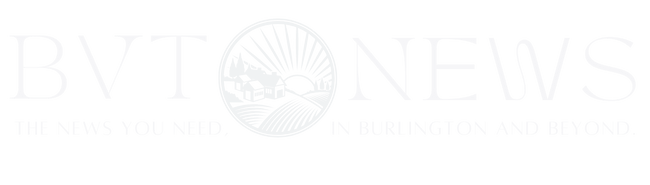 a white logo with a black background