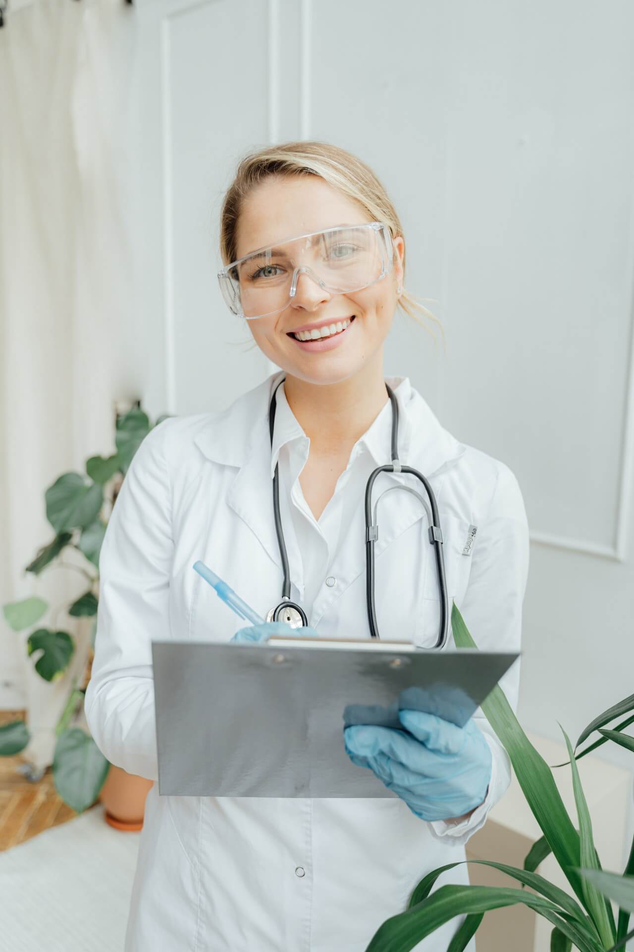 a doctor holding a laptop