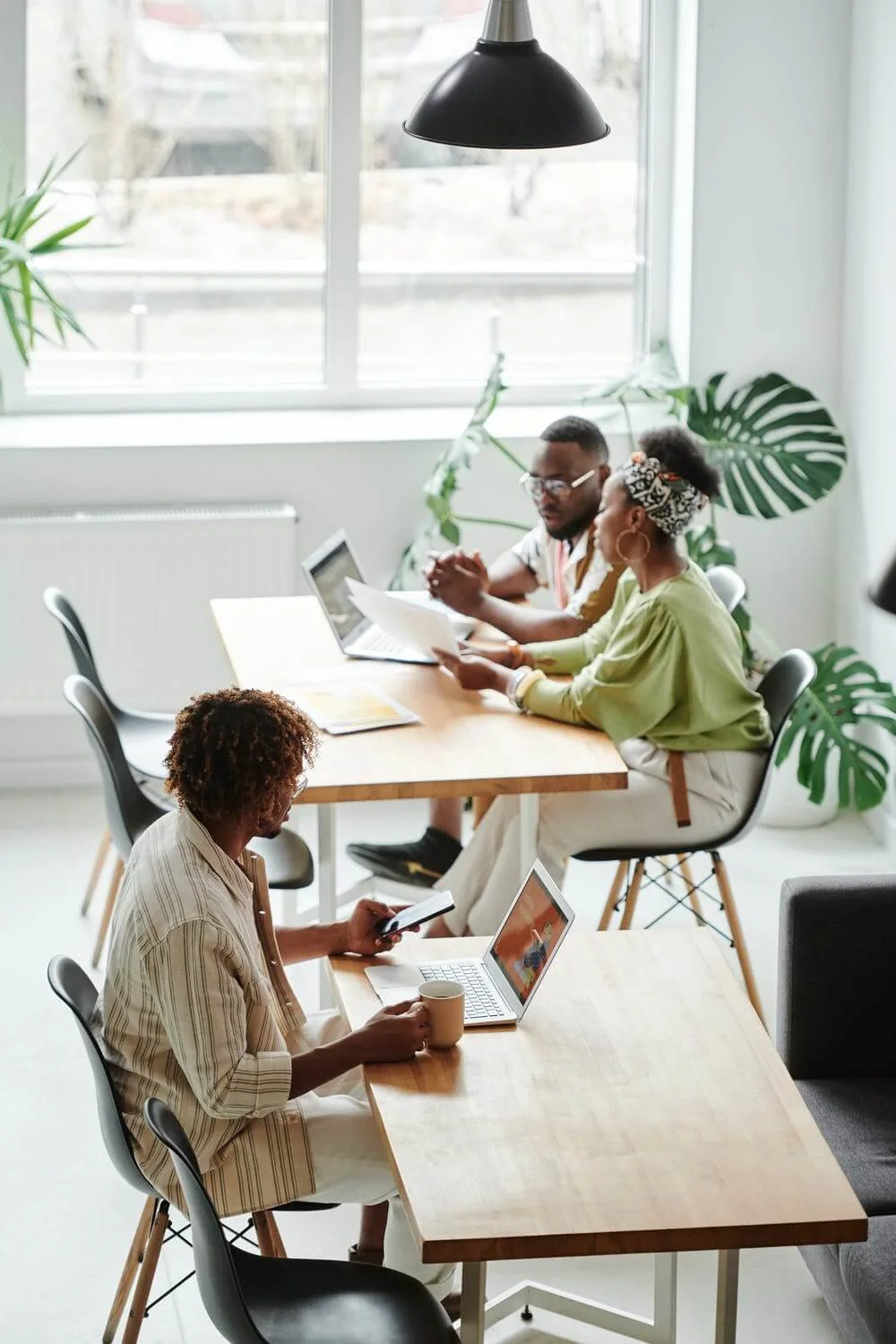 a group of people sitting at a table